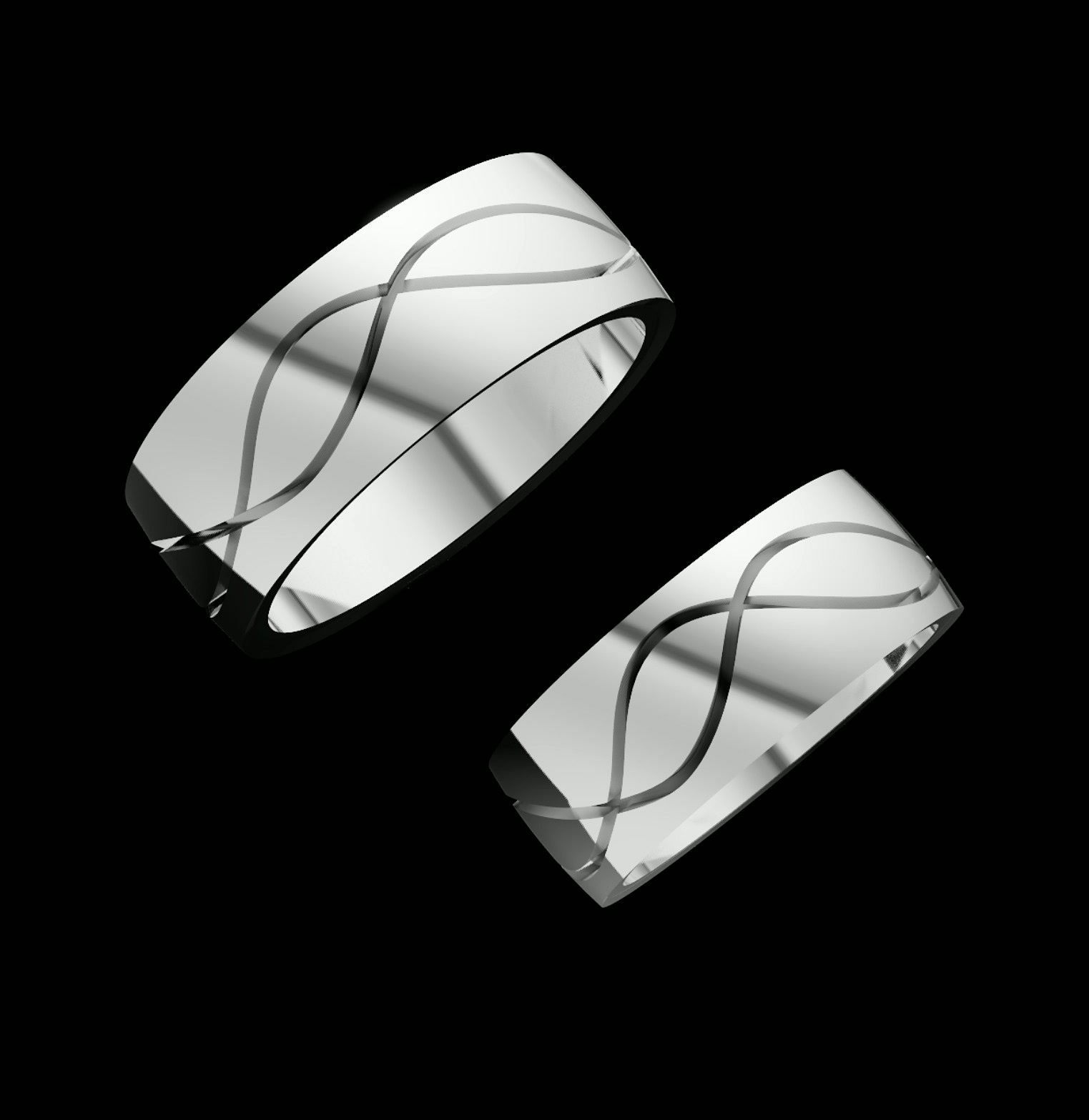Matching wedding bands with engraved infinity pattern